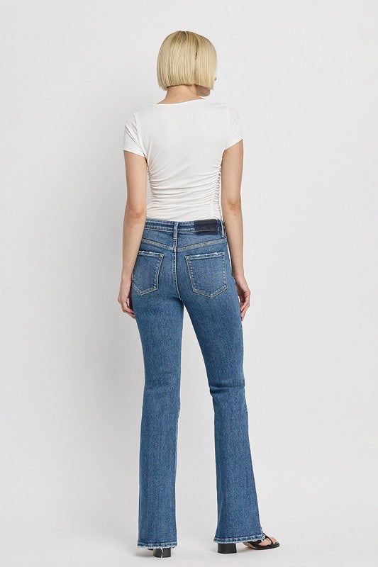 High Rise Slant Hem Flare Jeans